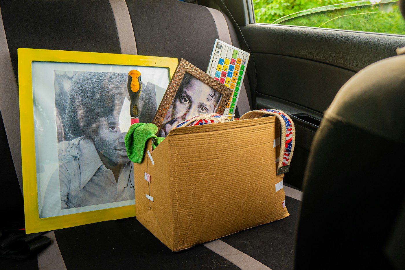 Thoughtfully packed belongings in a vehicle rear seat
