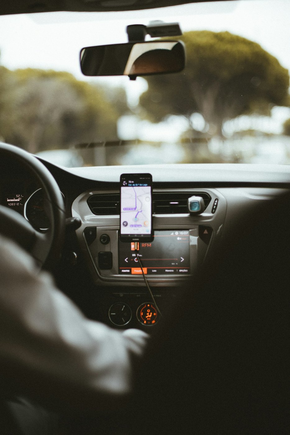 Phone mounted on a car dashboard